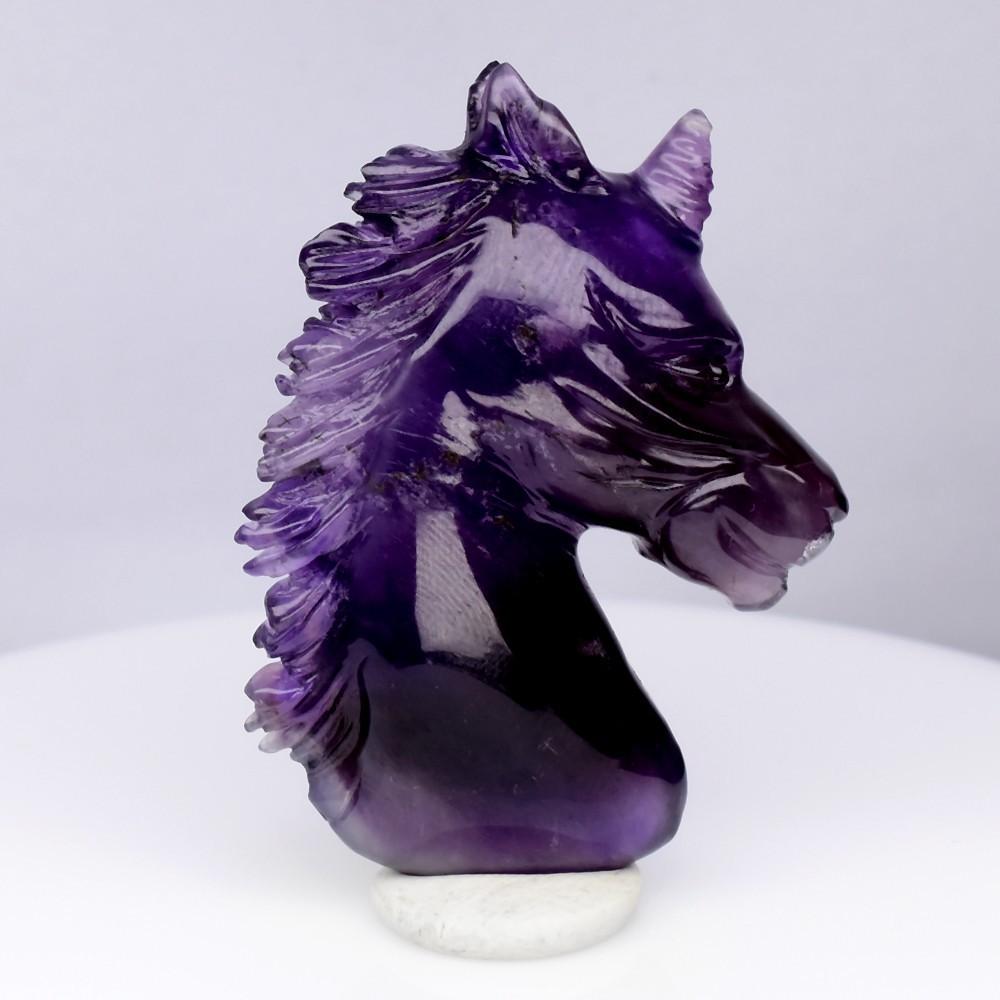 67.93 Carats Natural Amethyst Carving of a Unicorn at PristineAuction.com 67.93 Carats Natural Amethyst Carving of a Unicorn at PristineAuction.com