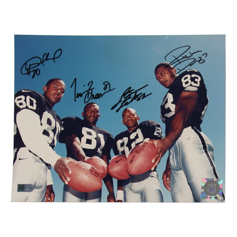 Raiders 8x10 Photo Signed By (4) with Desmond Howard, Tim Brown, Rickey Dudley & James Jett (AIV) at PristineAuction.com Raiders 8x10 Photo Signed By (4) with Desmond Howard, Tim Brown, Rickey Dudley & James Jett (AIV) at PristineAuction.com