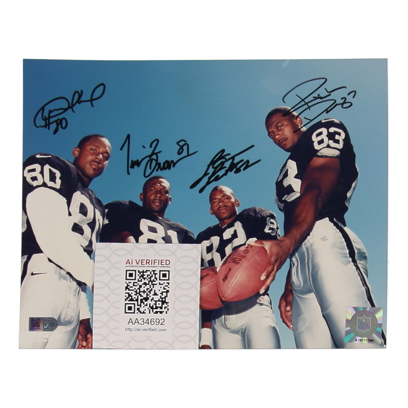 Raiders 8x10 Photo Signed By (4) with Desmond Howard, Tim Brown, Rickey Dudley & James Jett (AIV) at PristineAuction.com Raiders 8x10 Photo Signed By (4) with Desmond Howard, Tim Brown, Rickey Dudley & James Jett (AIV) at PristineAuction.com