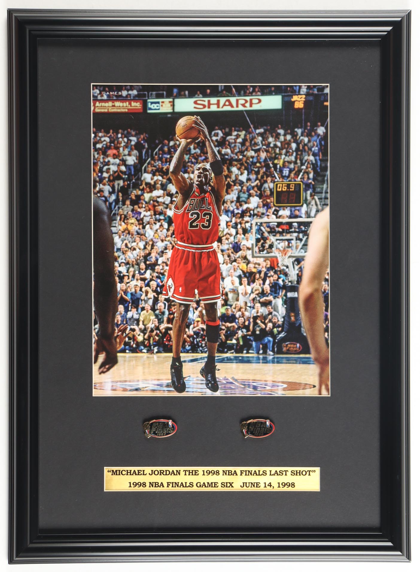 Michael Jordan "The 1998 Finals Shot" Custom Framed Photo Display with (2) NBA Finals Pins at PristineAuction.com Michael Jordan "The 1998 Finals Shot" Custom Framed Photo Display with (2) NBA Finals Pins at PristineAuction.com