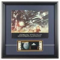 1977 "Star Wars" Movie Release Custom Framed Booklet Display with Original 1977 Film Cel with Hologram at PristineAuction.com