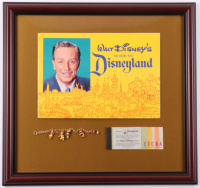 1963 Disneyland Custom Framed Vintage On-Site Park Guide with Vintage A-E Ticket Book & Gold Charm Bracelet at PristineAuction.com