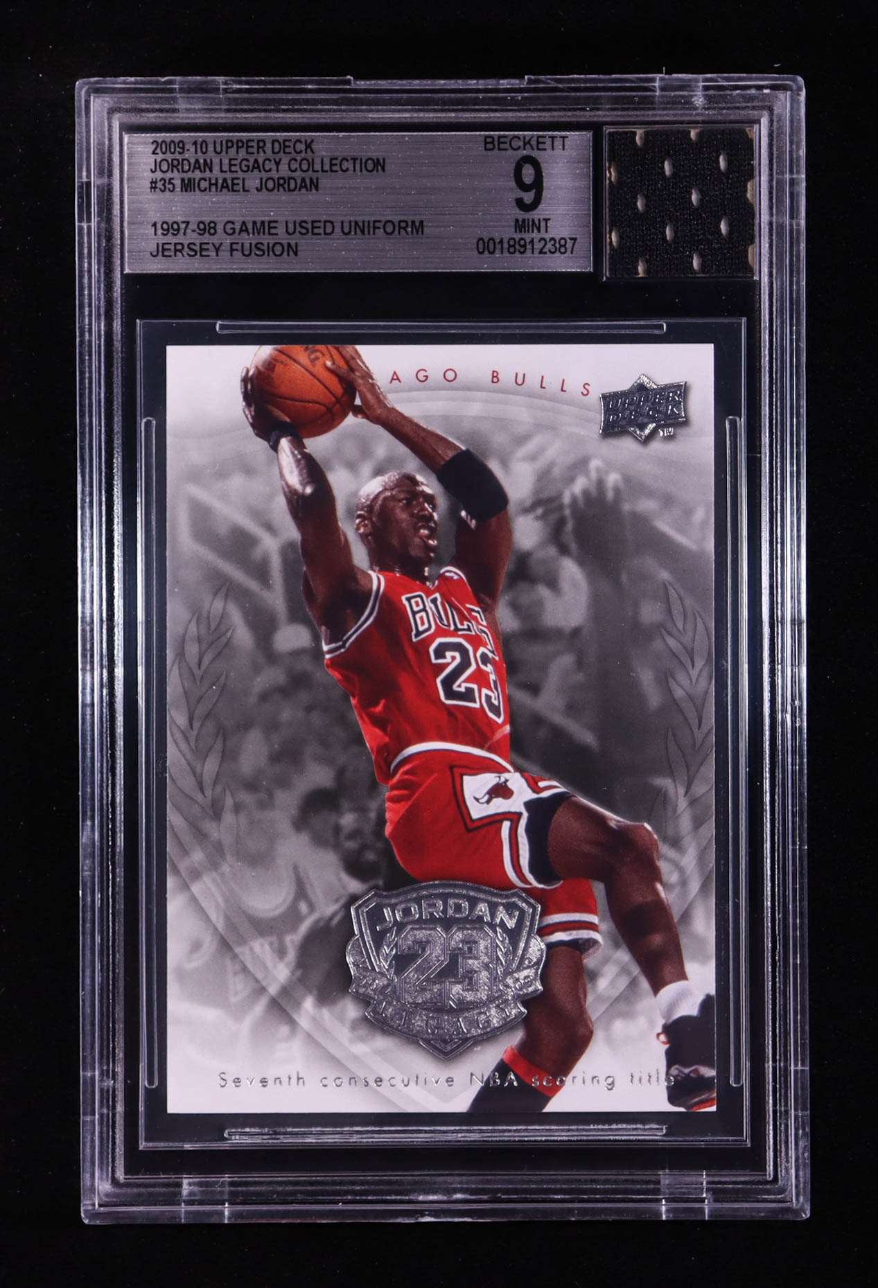 Michael Jordan 2009-10 Upper Deck Michael Jordan Legacy Collection #35 With Game-Used Uniform Swatch (BGS 9) at PristineAuction.com Michael Jordan 2009-10 Upper Deck Michael Jordan Legacy Collection #35 With Game-Used Uniform Swatch (BGS 9) at PristineAuction.com