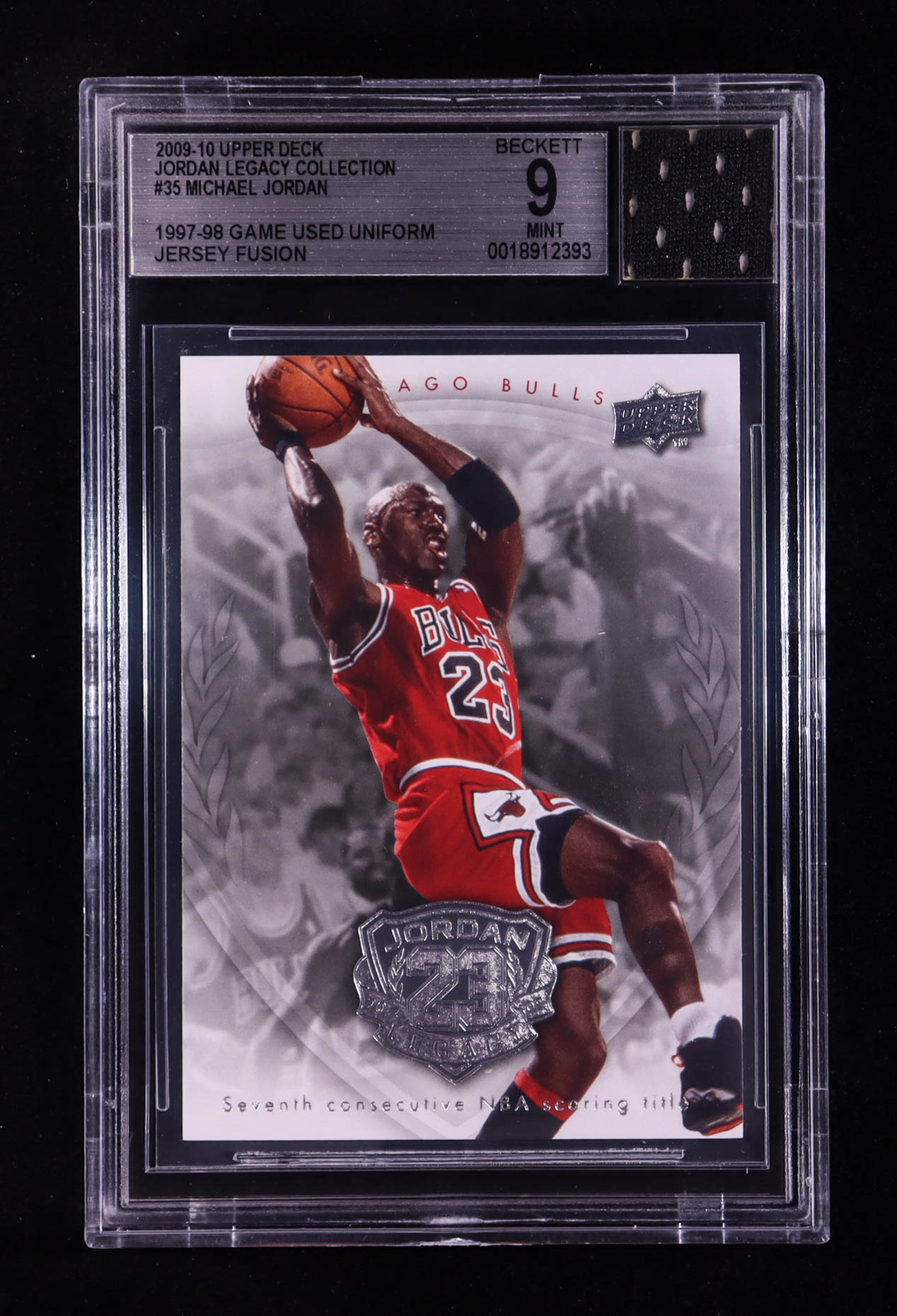 Michael Jordan 2009-10 Upper Deck Michael Jordan Legacy Collection #35 With Game-Used Uniform Swatch (BGS 9) at PristineAuction.com Michael Jordan 2009-10 Upper Deck Michael Jordan Legacy Collection #35 With Game-Used Uniform Swatch (BGS 9) at PristineAuction.com