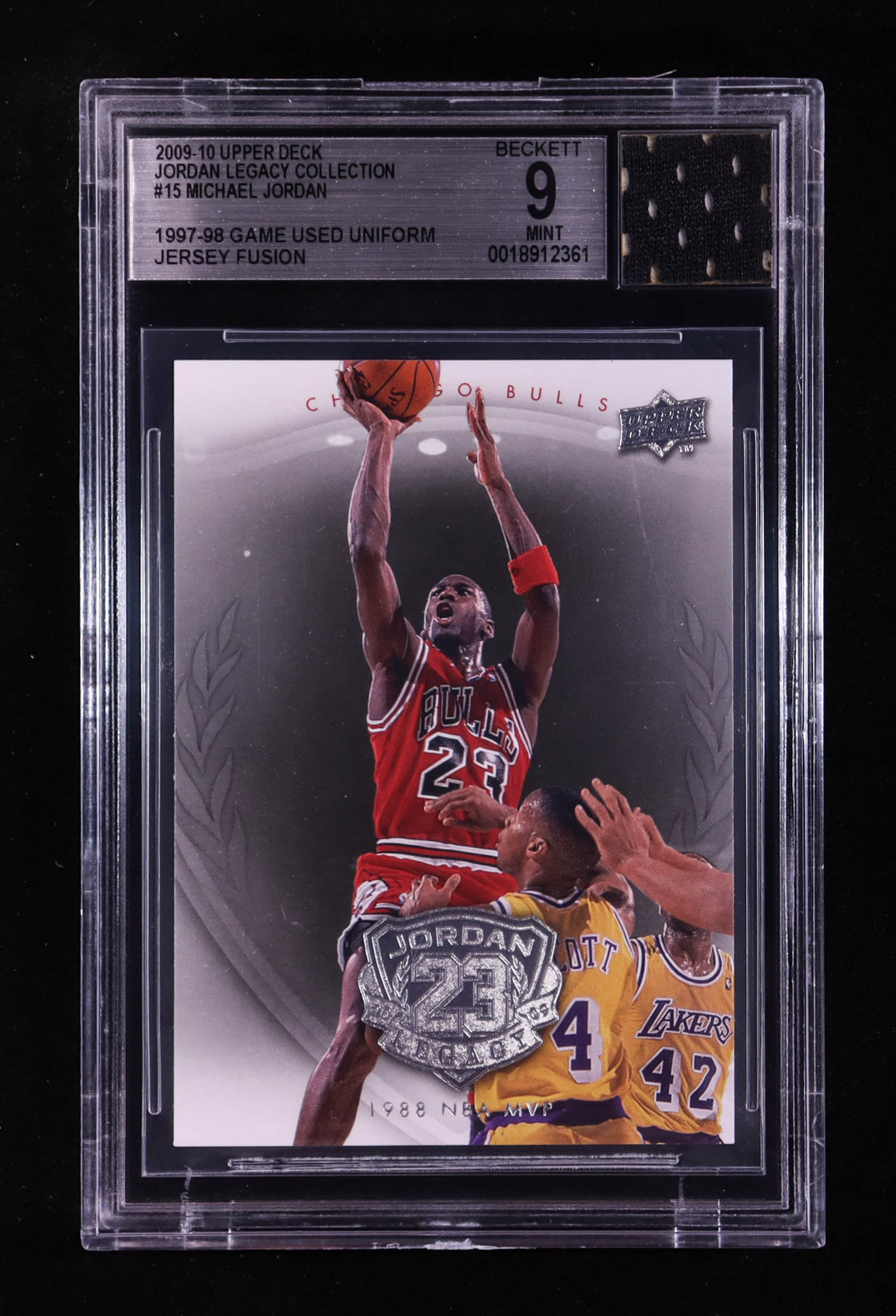 Michael Jordan 2009-10 Upper Deck Michael Jordan Legacy Collection #15 With Game-Used Uniform Swatch (BGS 9) at PristineAuction.com Michael Jordan 2009-10 Upper Deck Michael Jordan Legacy Collection #15 With Game-Used Uniform Swatch (BGS 9) at PristineAuction.com