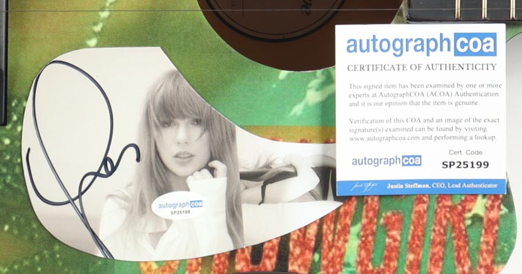 Taylor Swift Guitar with Signed Custom Insert Pickguard (ACOA) at PristineAuction.com Taylor Swift Guitar with Signed Custom Insert Pickguard (ACOA) at PristineAuction.com