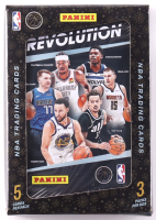 2023-24 Panini Revolutions Basketball Trading Card Tin with (3) Packs at PristineAuction.com
