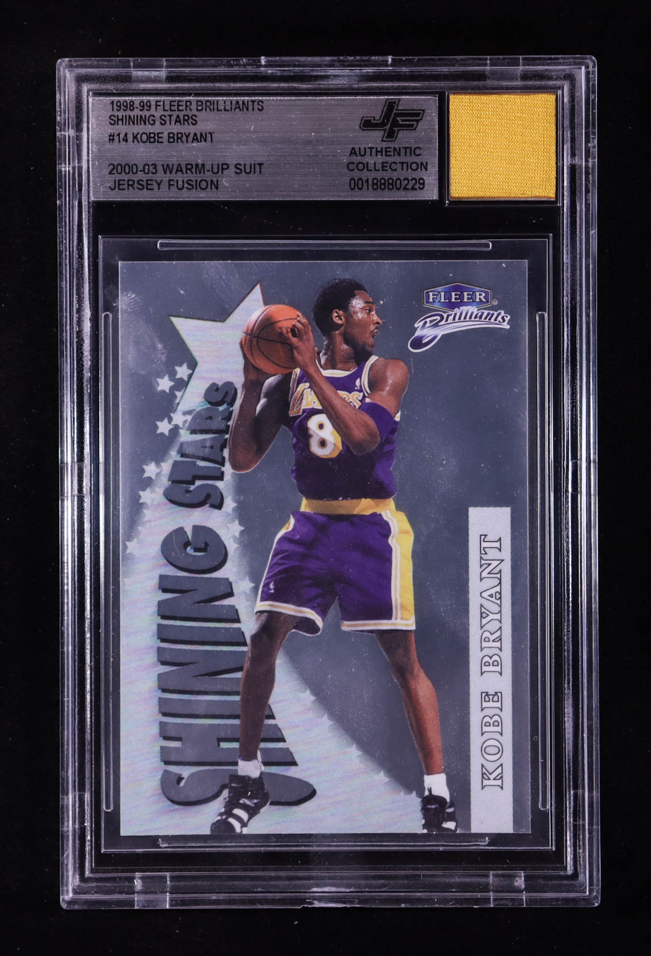 Kobe Bryant 1998-99 Fleer Brilliants Shining Stars #14 With Warm-Up Suit Swatch (BGS) at PristineAuction.com Kobe Bryant 1998-99 Fleer Brilliants Shining Stars #14 With Warm-Up Suit Swatch (BGS) at PristineAuction.com