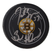 Brad Marchand & Patrice Bergeron Signed Bruins Logo Hockey Puck (Bergeron & Marchand) at PristineAuction.com