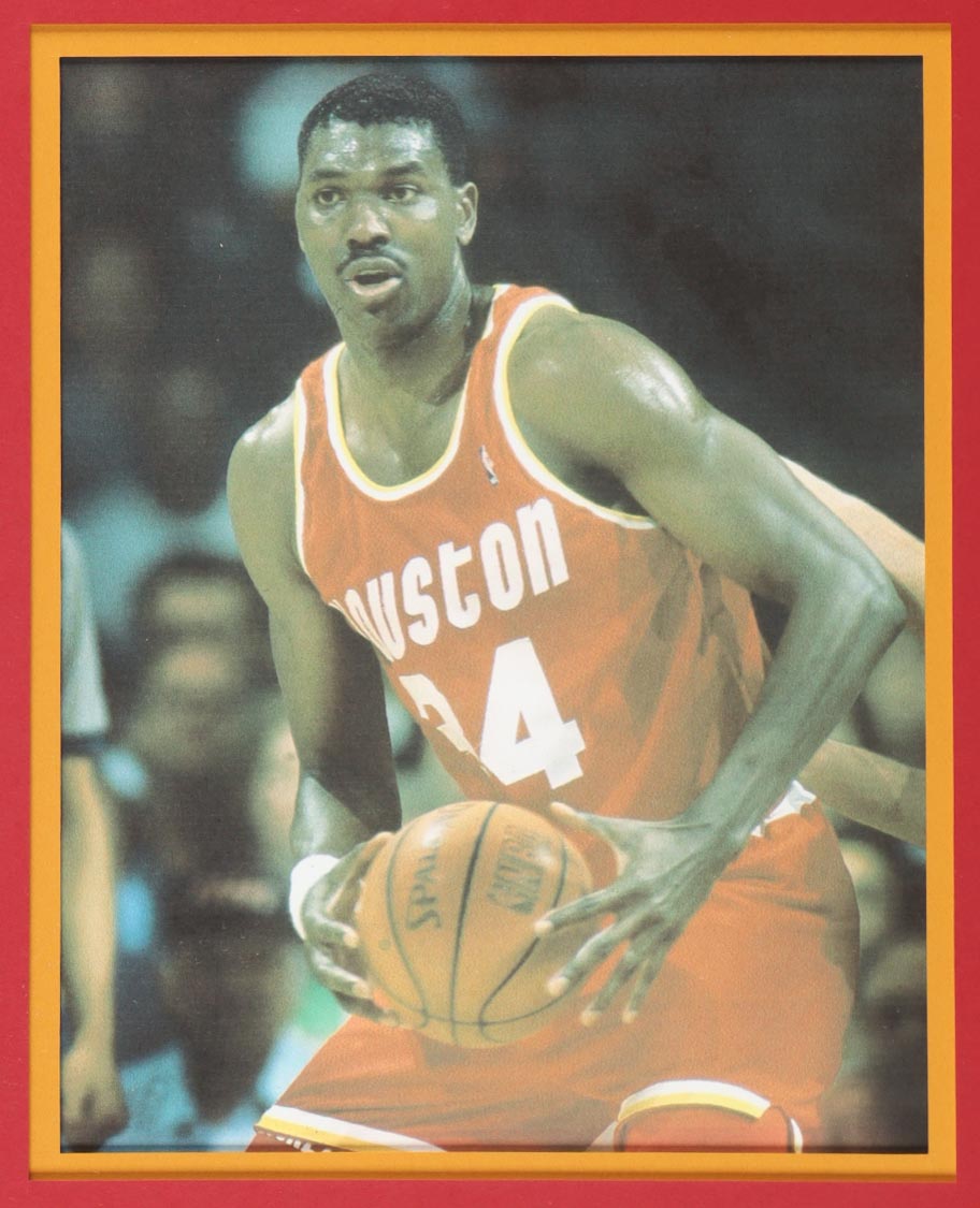Hakeem Olajuwon Signed Custom Framed Jersey Display with Photos (Beckett) at PristineAuction.com Hakeem Olajuwon Signed Custom Framed Jersey Display with Photos (Beckett) at PristineAuction.com