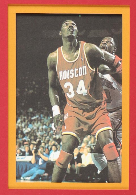 Hakeem Olajuwon Signed Custom Framed Jersey Display with Photos (Beckett) at PristineAuction.com Hakeem Olajuwon Signed Custom Framed Jersey Display with Photos (Beckett) at PristineAuction.com