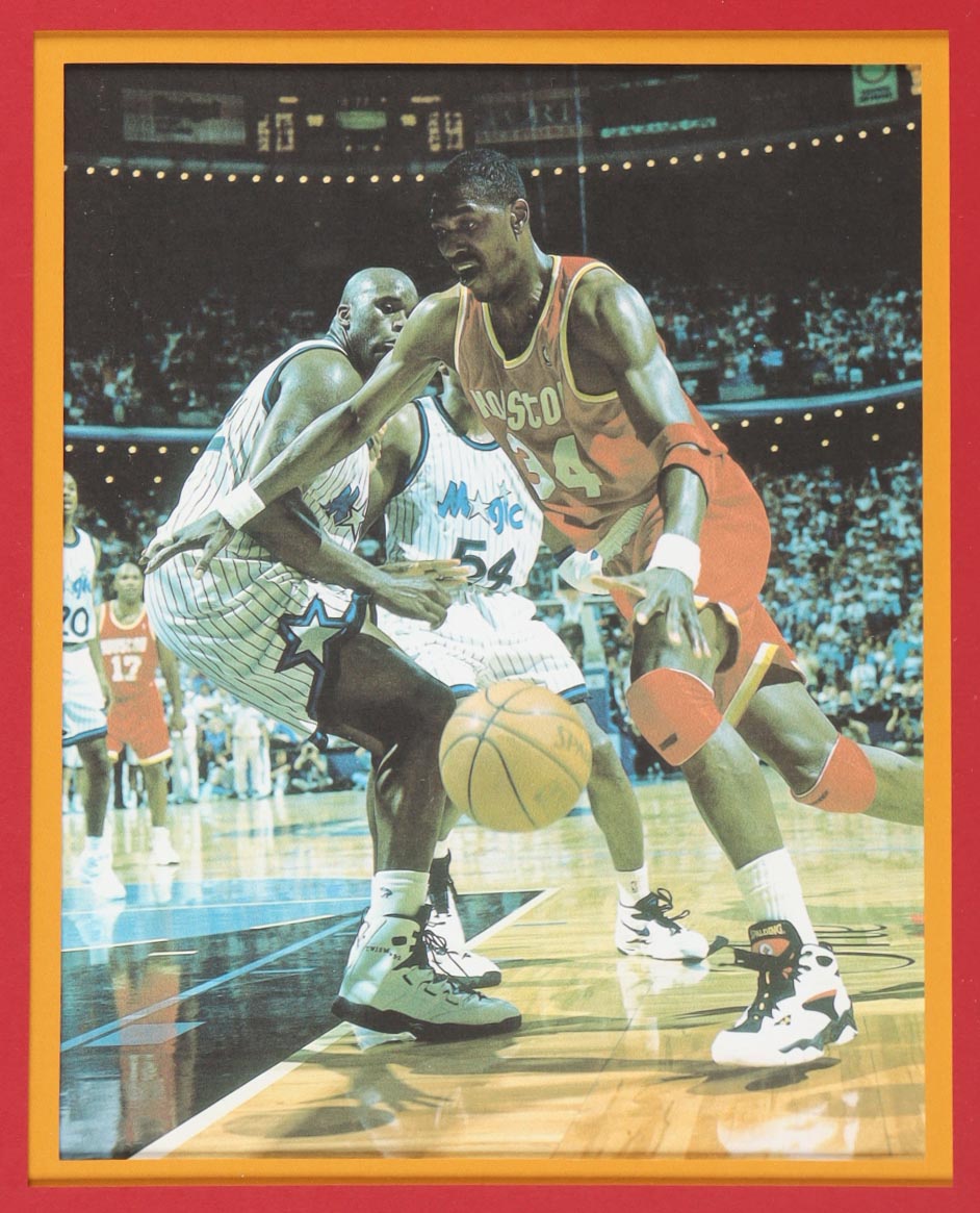 Hakeem Olajuwon Signed Custom Framed Jersey Display with Photos (Beckett) at PristineAuction.com Hakeem Olajuwon Signed Custom Framed Jersey Display with Photos (Beckett) at PristineAuction.com