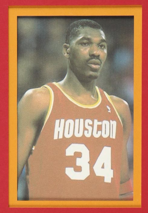 Hakeem Olajuwon Signed Custom Framed Jersey Display with Photos (Beckett) at PristineAuction.com Hakeem Olajuwon Signed Custom Framed Jersey Display with Photos (Beckett) at PristineAuction.com