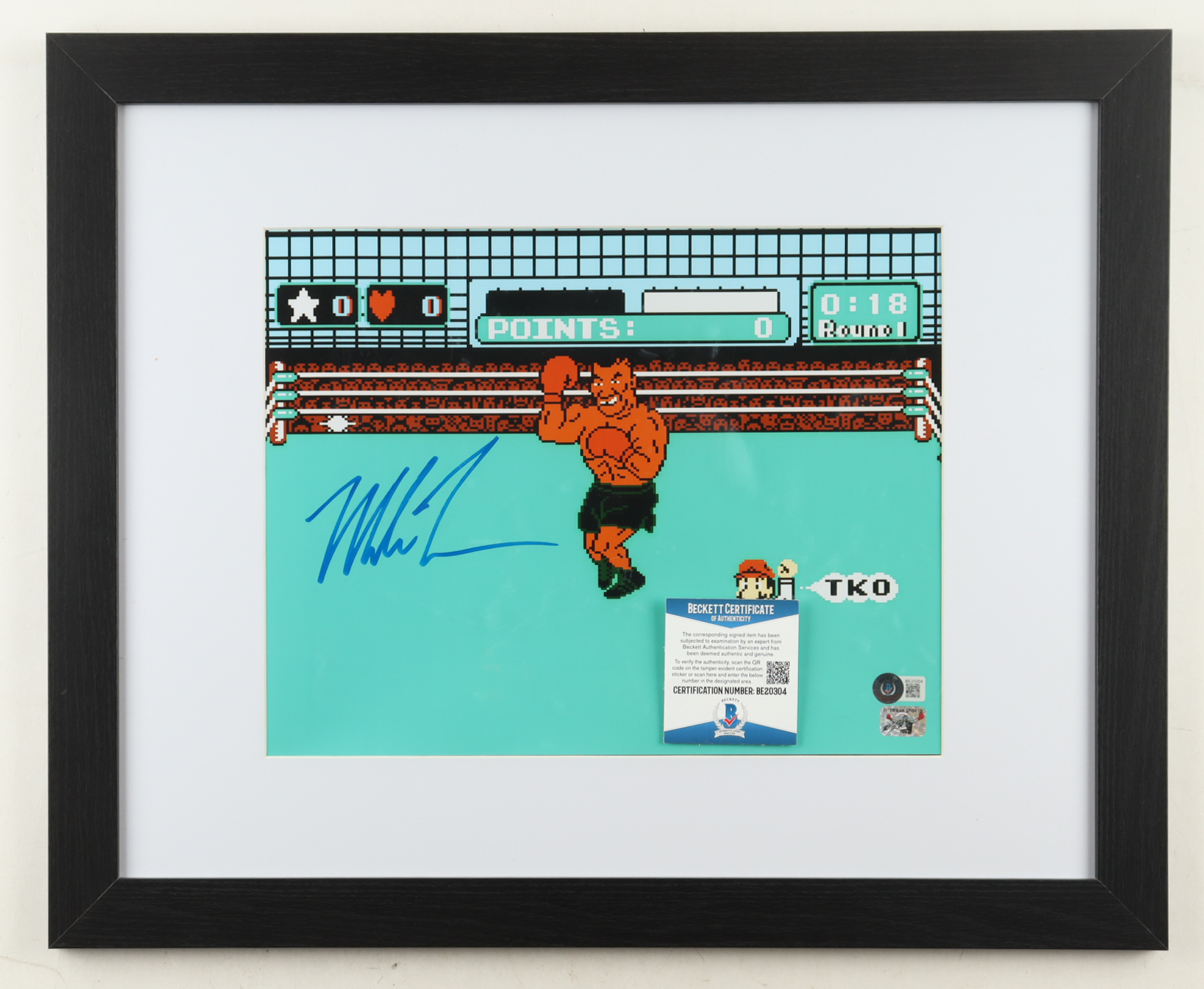 Mike Tyson Signed Custom Framed "Punch-Out!!" Photo Display (Beckett & Tyson) at PristineAuction.com Mike Tyson Signed Custom Framed "Punch-Out!!" Photo Display (Beckett & Tyson) at PristineAuction.com
