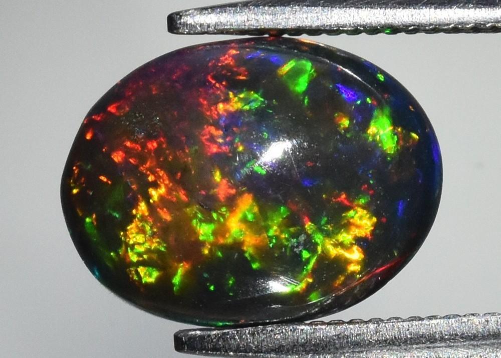 1.50 Carats Natural Black Opal Loose at PristineAuction.com 1.50 Carats Natural Black Opal Loose at PristineAuction.com