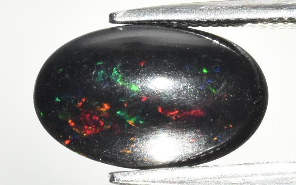 1.69 Carats Natural Black Opal Loose at PristineAuction.com 1.69 Carats Natural Black Opal Loose at PristineAuction.com