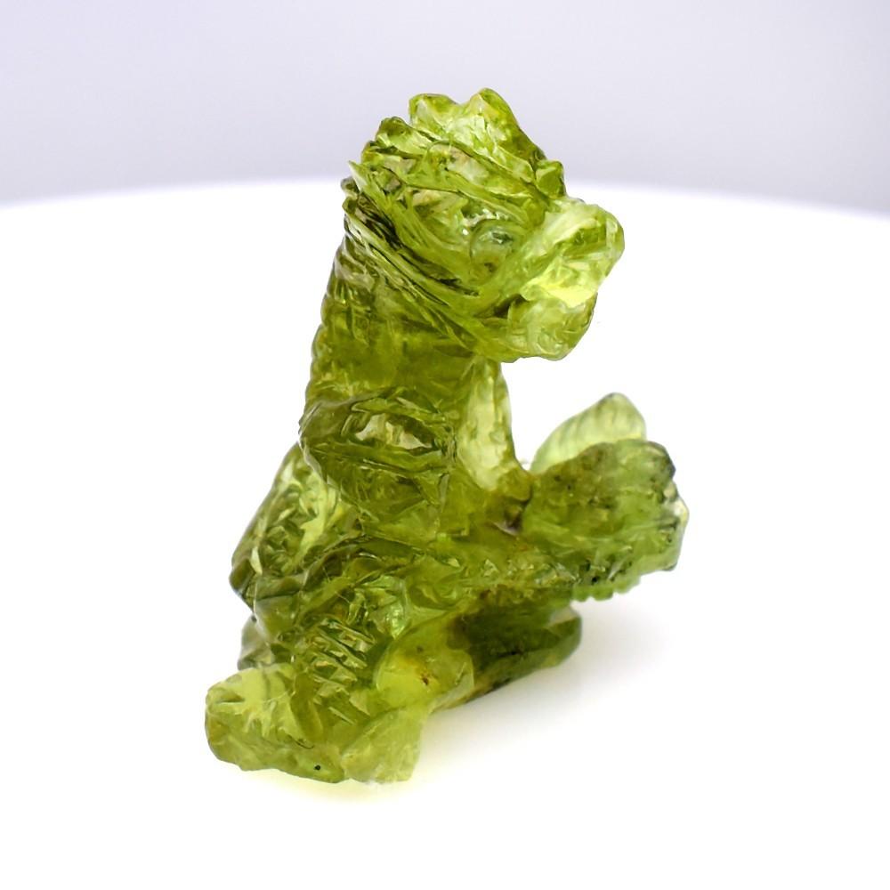 21.58 Carats Natural Green Garnet Carving of a Dragon at PristineAuction.com 21.58 Carats Natural Green Garnet Carving of a Dragon at PristineAuction.com