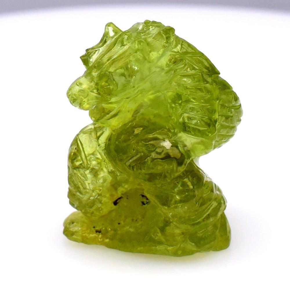 21.58 Carats Natural Green Garnet Carving of a Dragon at PristineAuction.com 21.58 Carats Natural Green Garnet Carving of a Dragon at PristineAuction.com