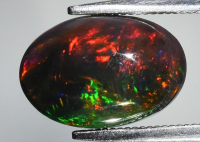 2.38 Carats Natural Black Opal Loose | $2,200 Estimated Retail Value (UGL Cert) at PristineAuction.com