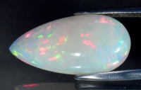 6.31 Carats Natural White Opal Loose | $2,400 Estimated Retail Value (UGL Cert) at PristineAuction.com