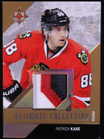 Patrick Kane  2014-15 Ultimate Collection Gold Spectrum Patch Game-Used #57 #17/35 at PristineAuction.com