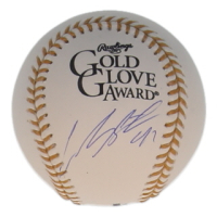 Carlos Santana Signed Gold Glove Award Logo Baseball (JSA) at PristineAuction.com