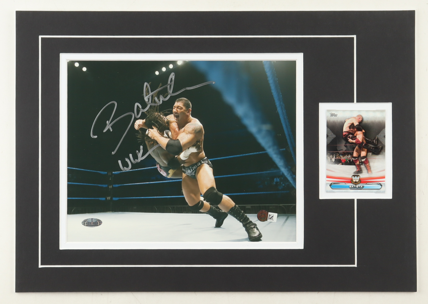 Dave Bautista Signed 12x17 Custom Matted Photo Display with Trading Card Inscribed "WWE" (Steiner & SM) at PristineAuction.com Dave Bautista Signed 12x17 Custom Matted Photo Display with Trading Card Inscribed "WWE" (Steiner & SM) at PristineAuction.com