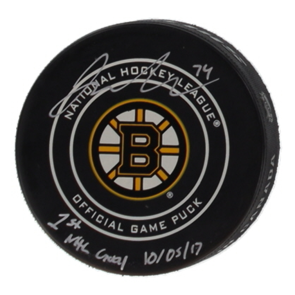 Jake DeBrusk Signed Bruins Logo Hockey Puck Inscribed "1st NHL Goal 10/05/17" (COJO) at PristineAuction.com