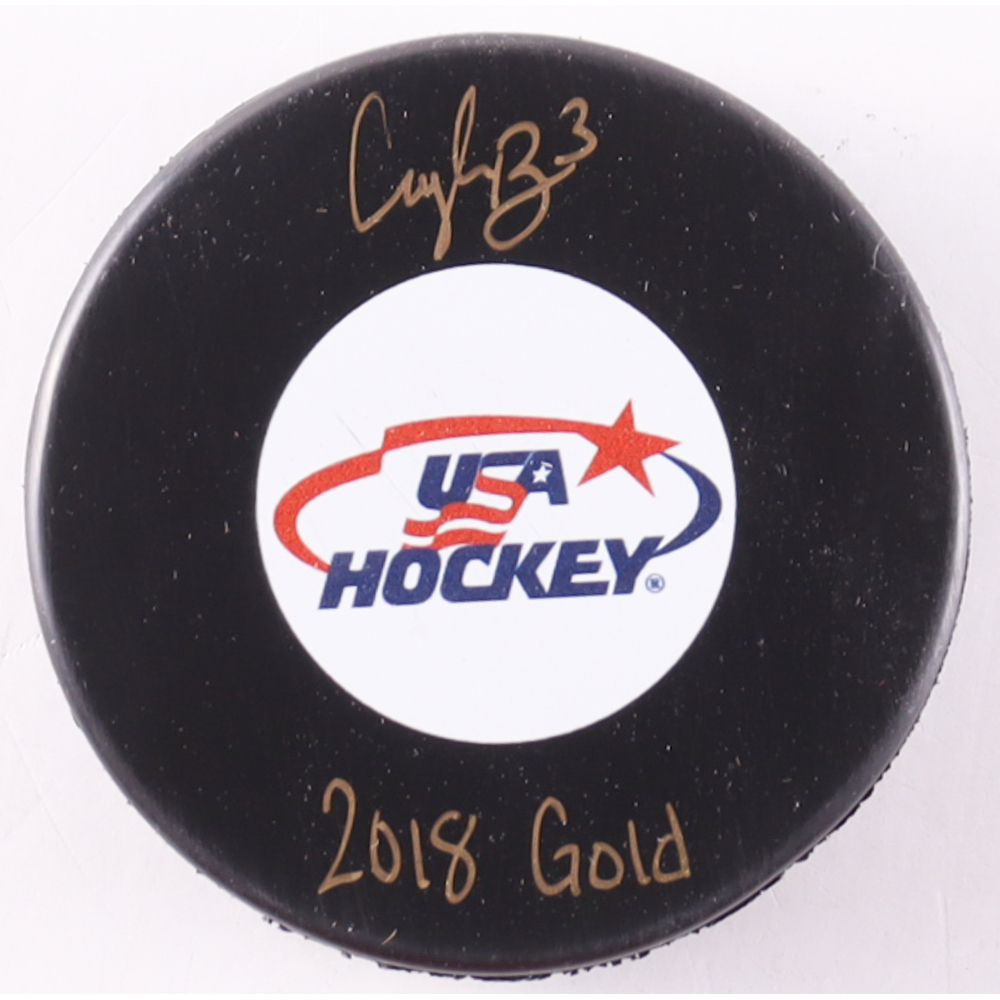 Cayla Barnes Signed Team USA Logo Hockey Puck Inscribed "2018 Gold" (Premium Autographs) at PristineAuction.com