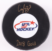 Cayla Barnes Signed Team USA Logo Hockey Puck Inscribed "2018 Gold" (Premium Autographs) at PristineAuction.com