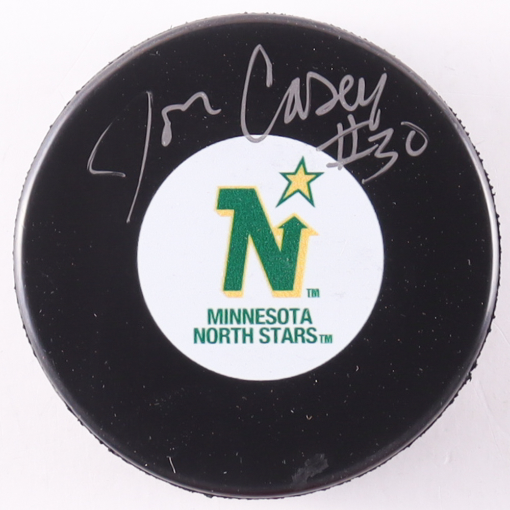 Jon Casey Signed North Stars Logo Hockey Puck (Premium Autographs) at PristineAuction.com