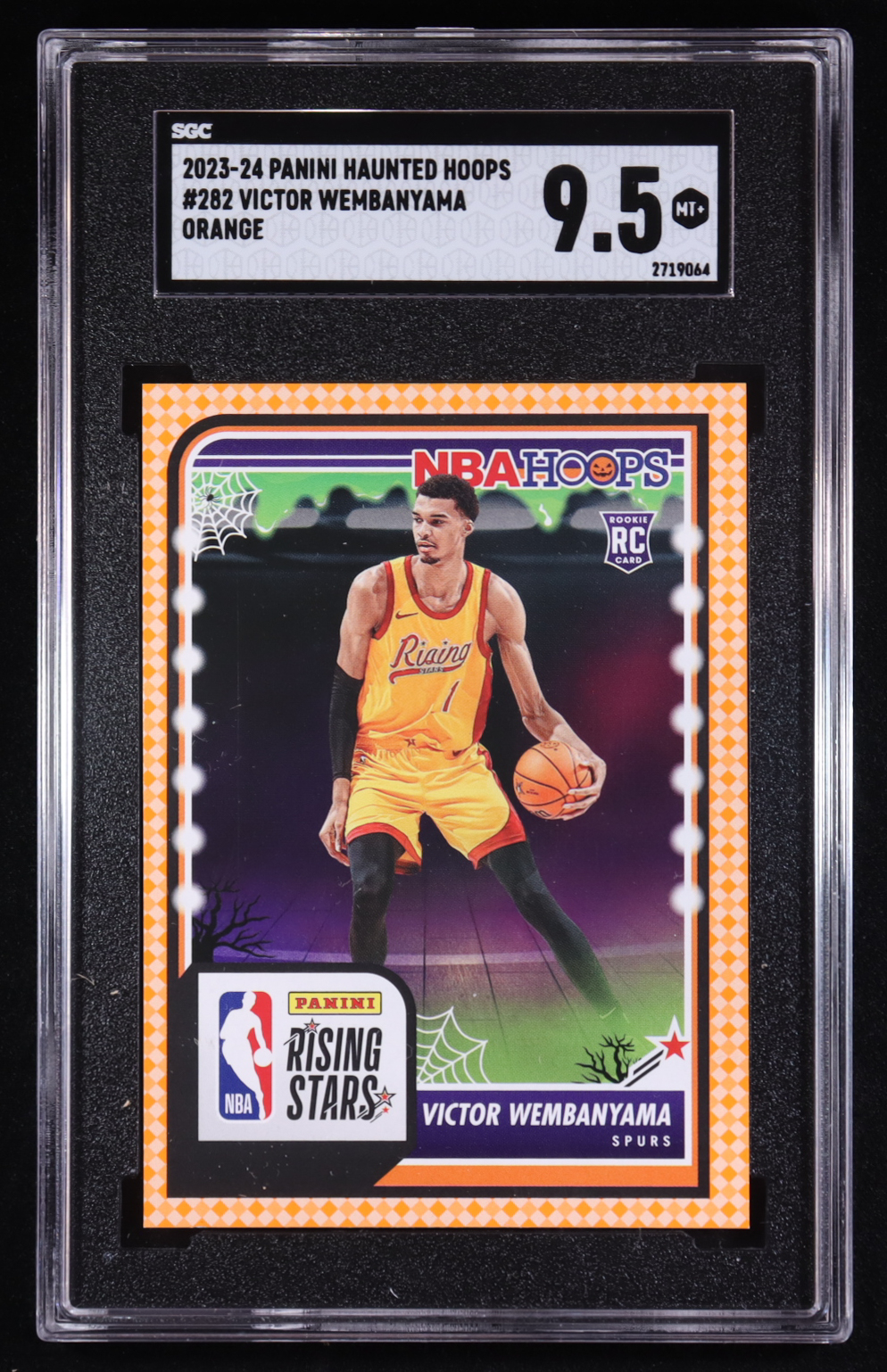 Victor Wembanyama 2023-24 Panini NBA Hoops Rising Stars Haunted Orange #282 RC (SGC 9.5) at PristineAuction.com Victor Wembanyama 2023-24 Panini NBA Hoops Rising Stars Haunted Orange #282 RC (SGC 9.5) at PristineAuction.com