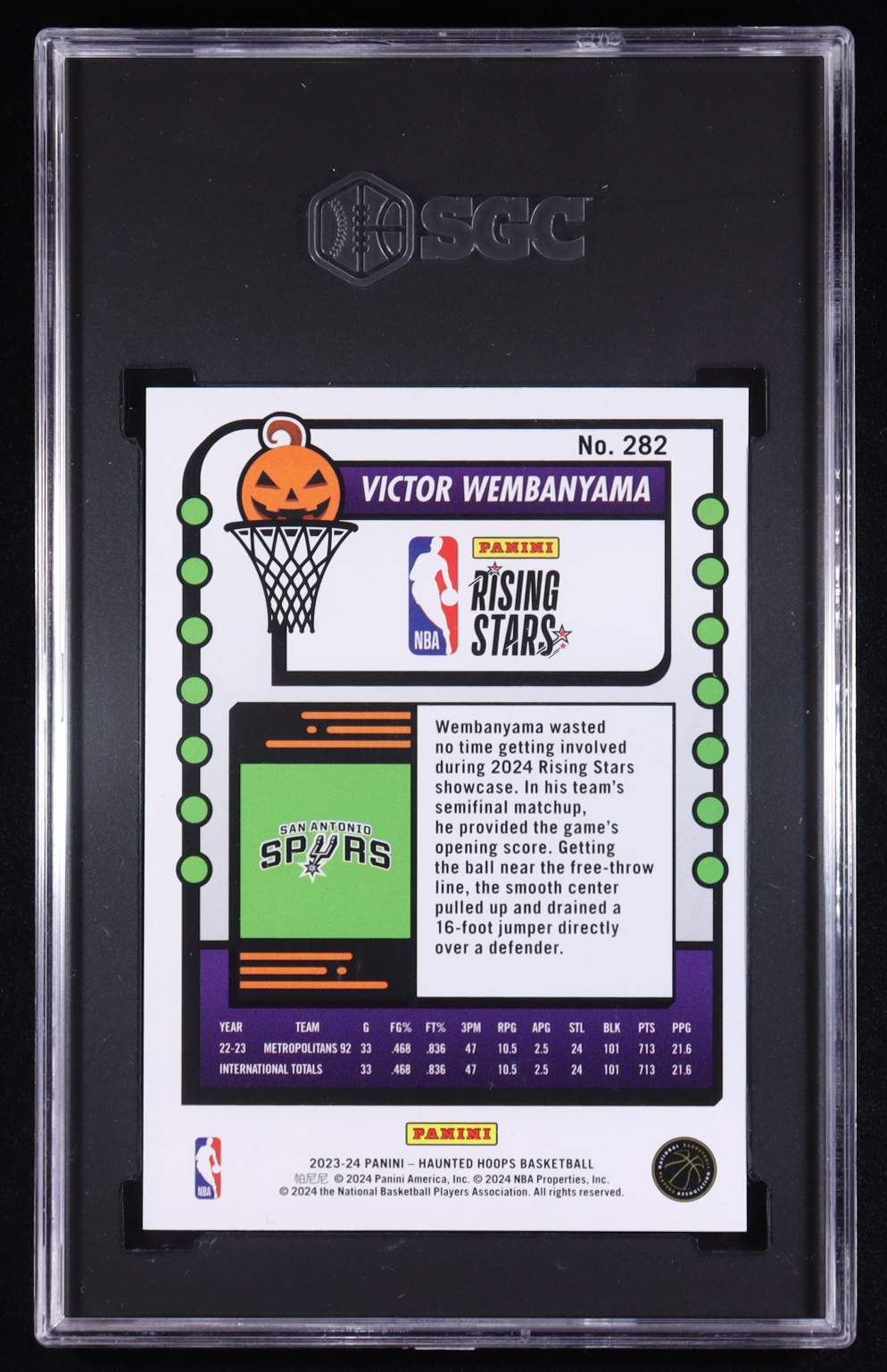 Victor Wembanyama 2023-24 Panini NBA Hoops Rising Stars Haunted Orange #282 RC (SGC 9.5) at PristineAuction.com Victor Wembanyama 2023-24 Panini NBA Hoops Rising Stars Haunted Orange #282 RC (SGC 9.5) at PristineAuction.com