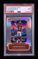 Jayden Daniels 2024 Donruss Optic Uptowns #2 RC (PSA 9) at PristineAuction.com