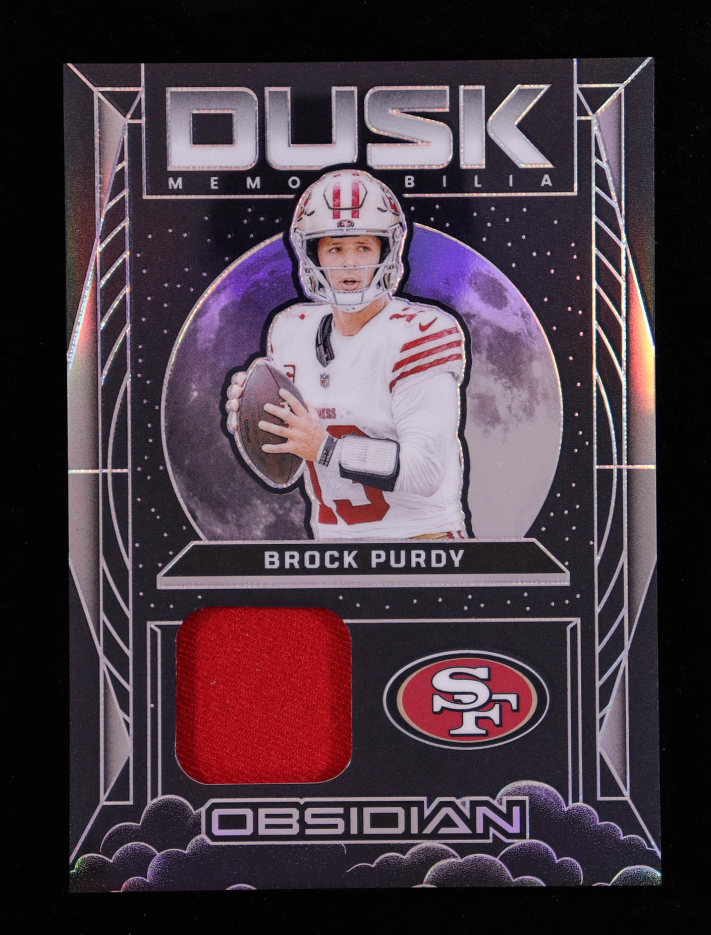 Brock Purdy 2024 Panini Obsidian Dusk Memorabilia #3 at PristineAuction.com Brock Purdy 2024 Panini Obsidian Dusk Memorabilia #3 at PristineAuction.com