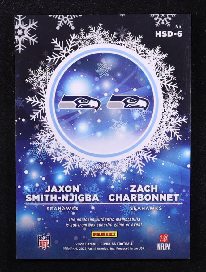 Jaxon Smith-Njigba / Zach Charbonnet 2023 Donruss Rookie Holiday Sweater Dual #6 RC at PristineAuction.com Jaxon Smith-Njigba / Zach Charbonnet 2023 Donruss Rookie Holiday Sweater Dual #6 RC at PristineAuction.com