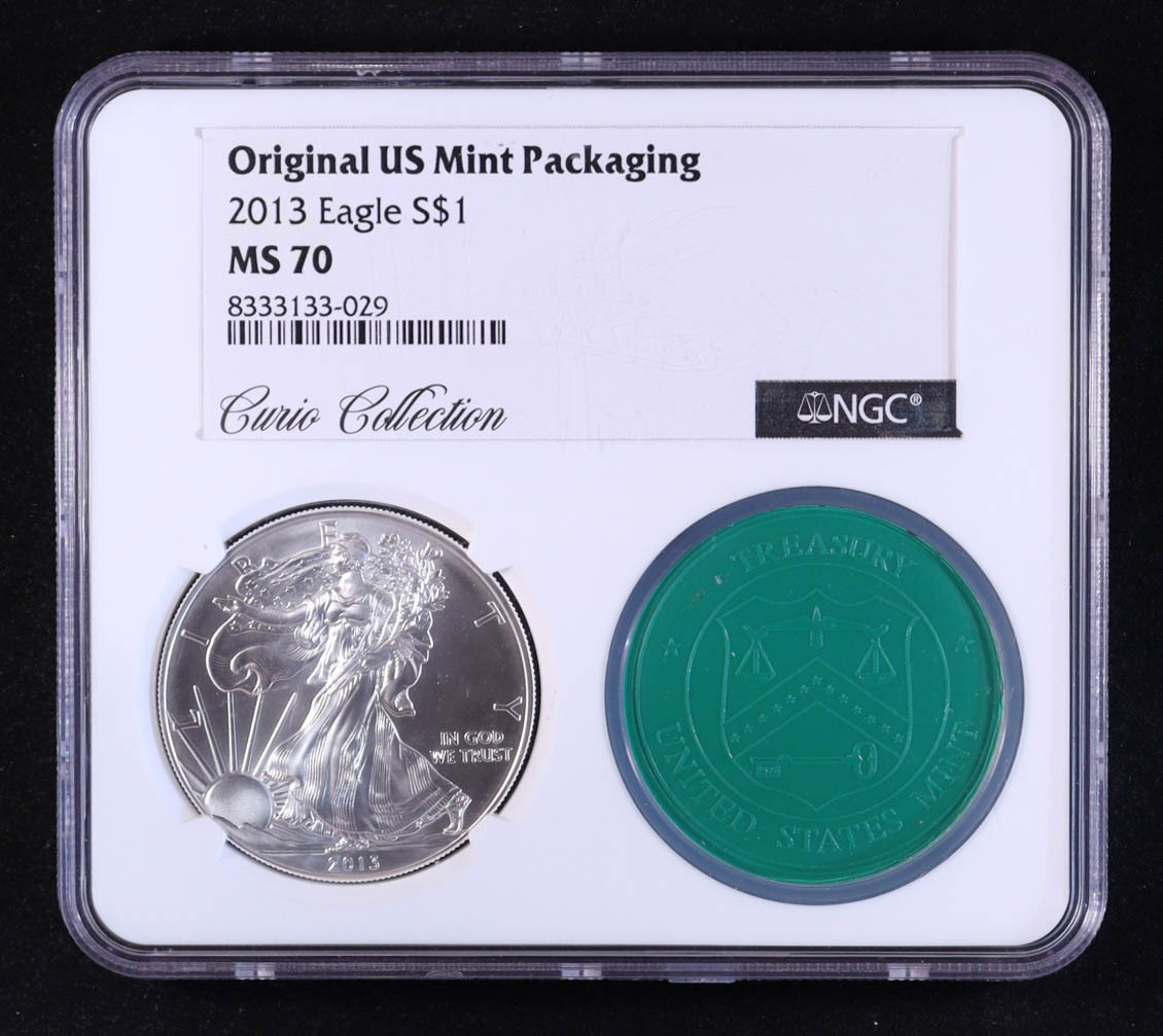 2013 American Silver $1 Eagle - Original U.S. Mint Packaging "Curio Collection" (NGC MS70) at PristineAuction.com 2013 American Silver $1 Eagle - Original U.S. Mint Packaging "Curio Collection" (NGC MS70) at PristineAuction.com