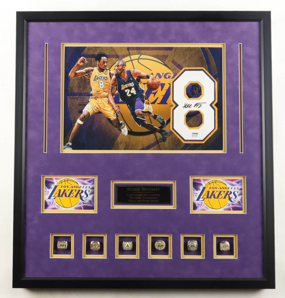 Kobe Bryant Signed Custom Framed Jersey Number Display & (7) Championship Rings & Name Plaque (PSA) at PristineAuction.com Kobe Bryant Signed Custom Framed Jersey Number Display & (7) Championship Rings & Name Plaque (PSA) at PristineAuction.com