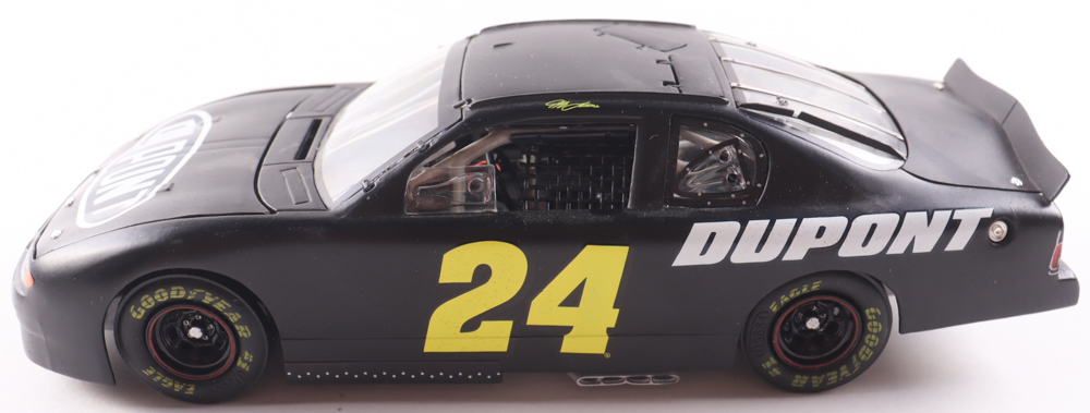 Jeff Gordon LE NASCAR #24 Dupont / Test 2002 Car Chevy Monte Carlo Elite 1:24 Scale Diecast Car at PristineAuction.com Jeff Gordon LE NASCAR #24 Dupont / Test 2002 Car Chevy Monte Carlo Elite 1:24 Scale Diecast Car at PristineAuction.com