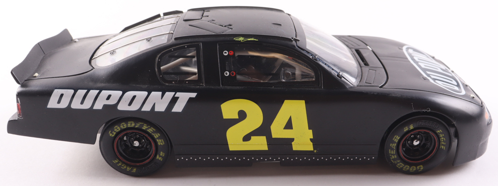 Jeff Gordon LE NASCAR #24 Dupont / Test 2002 Car Chevy Monte Carlo Elite 1:24 Scale Diecast Car at PristineAuction.com Jeff Gordon LE NASCAR #24 Dupont / Test 2002 Car Chevy Monte Carlo Elite 1:24 Scale Diecast Car at PristineAuction.com