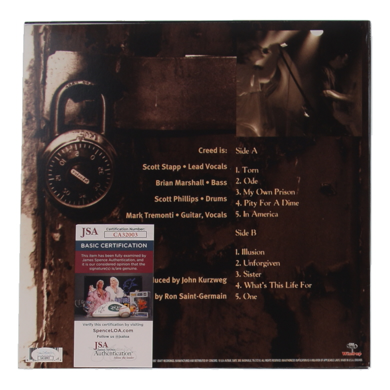 Creed "My Own Prison" Vinyl Record Album Band-Signed By (4) with Scott Stapp, Mark Tremonti, Brian Marshall & Scott Phillips (JSA) at PristineAuction.com Creed "My Own Prison" Vinyl Record Album Band-Signed By (4) with Scott Stapp, Mark Tremonti, Brian Marshall & Scott Phillips (JSA) at PristineAuction.com
