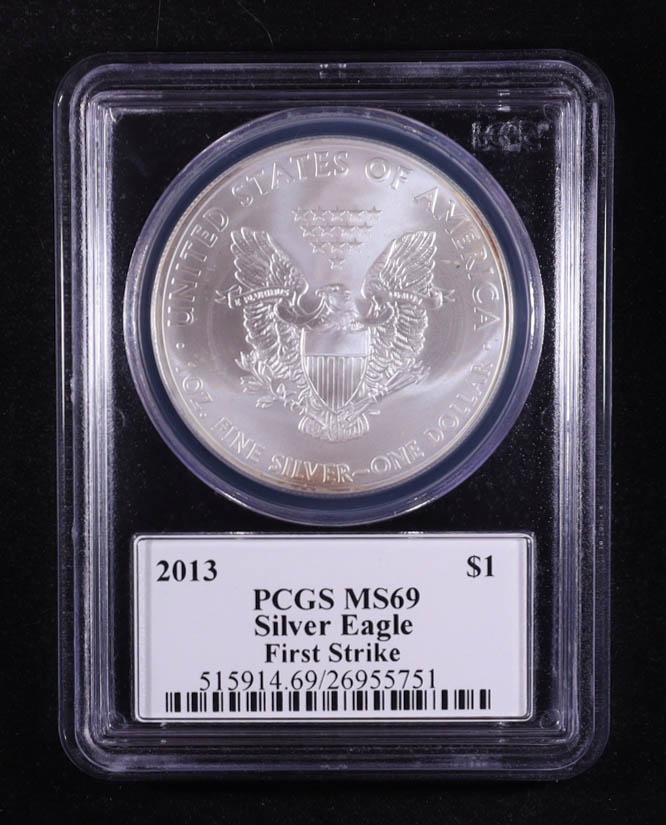 2013 American Silver Eagle, First Strike - John M. Mercanti Signature Label (PCGS MS69) at PristineAuction.com 2013 American Silver Eagle, First Strike - John M. Mercanti Signature Label (PCGS MS69) at PristineAuction.com