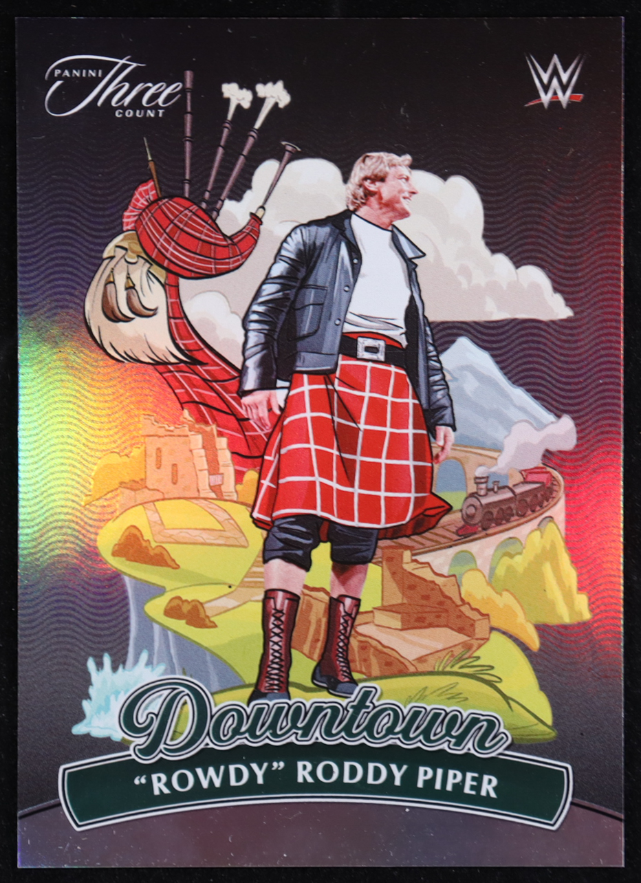 "Rowdy" Roddy Piper 2024 Panini Three Count WWE Downtown #9 at PristineAuction.com "Rowdy" Roddy Piper 2024 Panini Three Count WWE Downtown #9 at PristineAuction.com