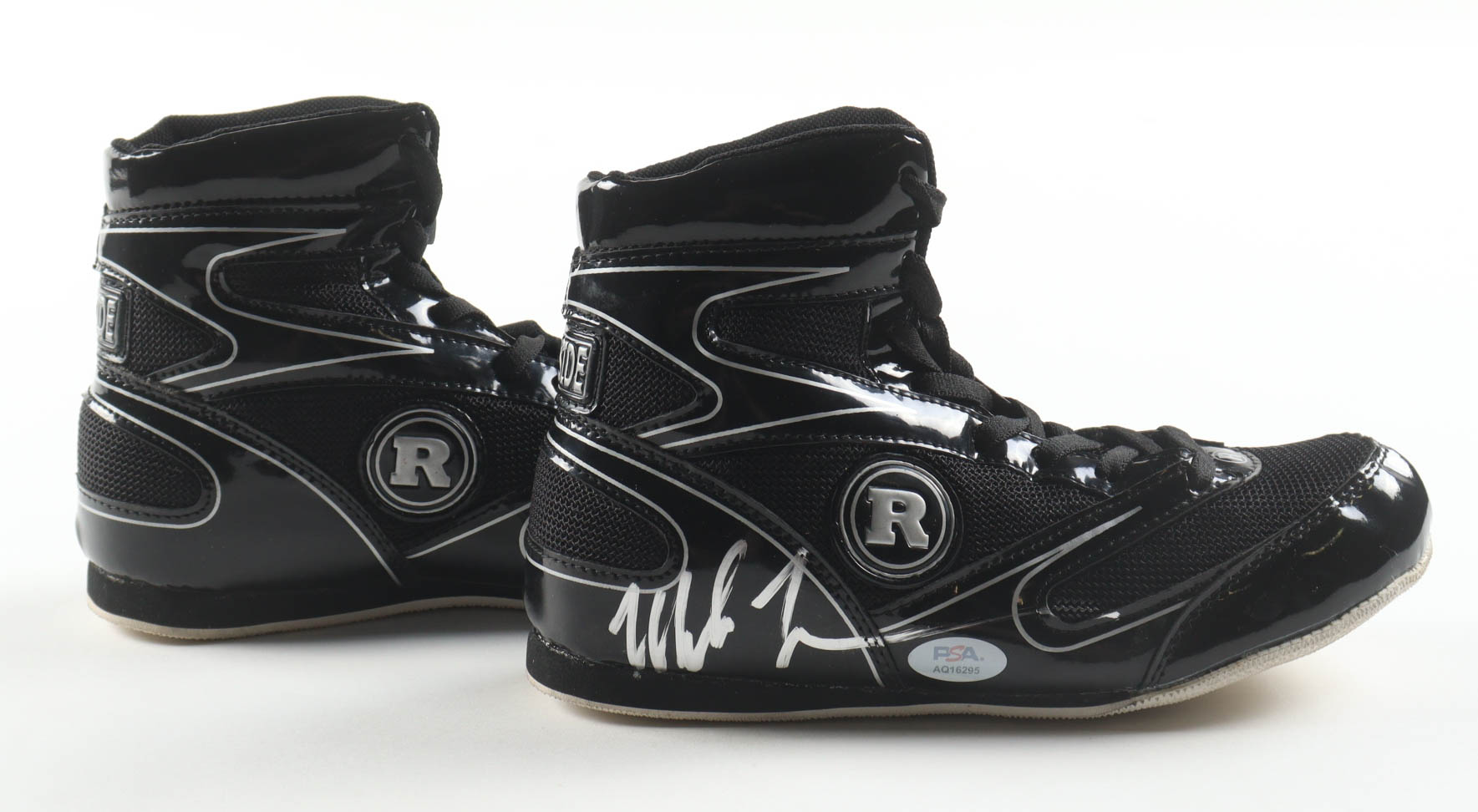 Mike Tyson Signed Ringside Set of (2) Boxing Shoes with Leroy Neiman Photoback Display Case (PSA & Tyson) at PristineAuction.com Mike Tyson Signed Ringside Set of (2) Boxing Shoes with Leroy Neiman Photoback Display Case (PSA & Tyson) at PristineAuction.com