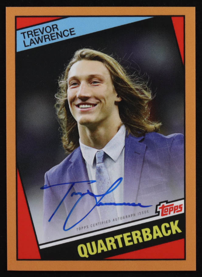 Trevor Lawrence 2021 Topps X Trevor Lawrence Autographs Orange #23 1984 Topps Football RC at PristineAuction.com Trevor Lawrence 2021 Topps X Trevor Lawrence Autographs Orange #23 1984 Topps Football RC at PristineAuction.com