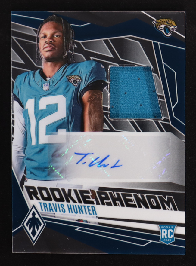 Travis Hunter 2025 Panini Phoenix Rookie Phenoms Jersey Autographs #18 RC #132/249 at PristineAuction.com Travis Hunter 2025 Panini Phoenix Rookie Phenoms Jersey Autographs #18 RC #132/249 at PristineAuction.com