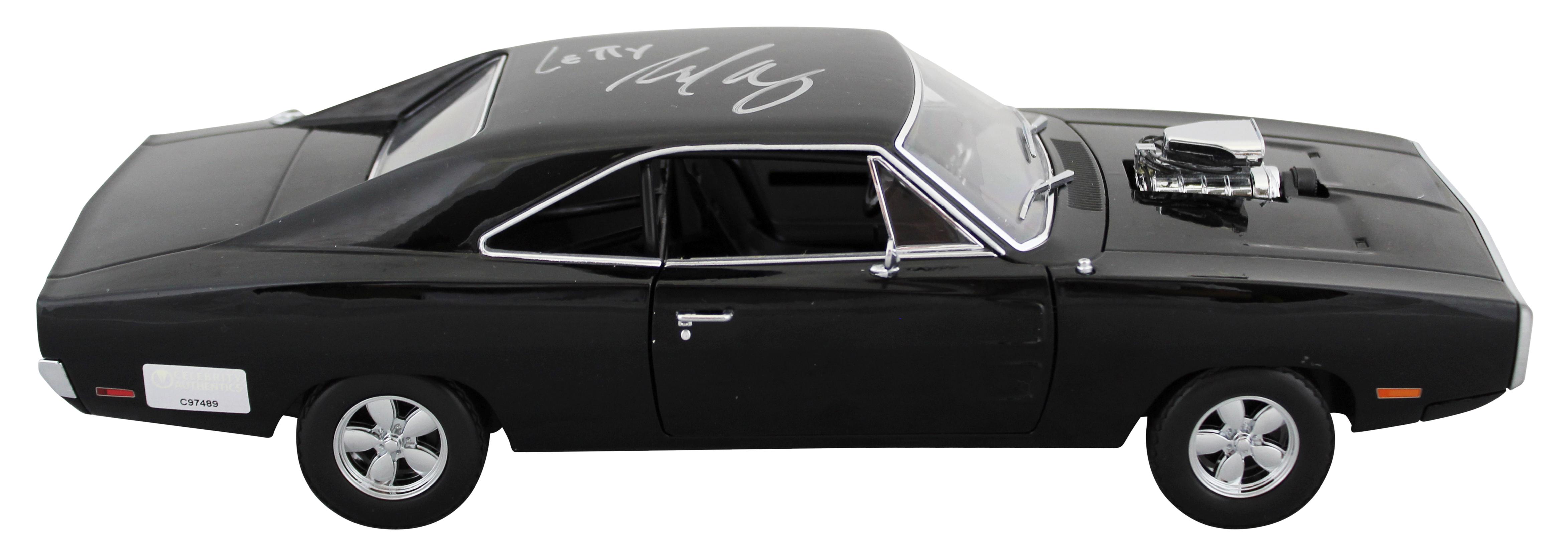 Michelle Rodriguez Signed "Fast & Furious" Dom's 1970 Dodge Charger 1:18 Scale Die-Cast Car Inscribed "Letty" (Celebrity Authentics) at PristineAuction.com Michelle Rodriguez Signed "Fast & Furious" Dom's 1970 Dodge Charger 1:18 Scale Die-Cast Car Inscribed "Letty" (Celebrity Authentics) at PristineAuction.com