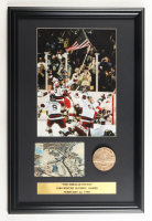 "The Miracle on Ice Team USA" Custom Framed Photo Display with Lake Placid 1980 Replica Gold Medal & Vintage On-Site Souvenir Postcard at PristineAuction.com