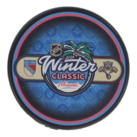 2026 Winter Classic Miami Logo Hockey Puck at PristineAuction.com