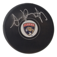 Sam Reinhart Signed Panthers Logo Hockey Puck (Fanatics) at PristineAuction.com